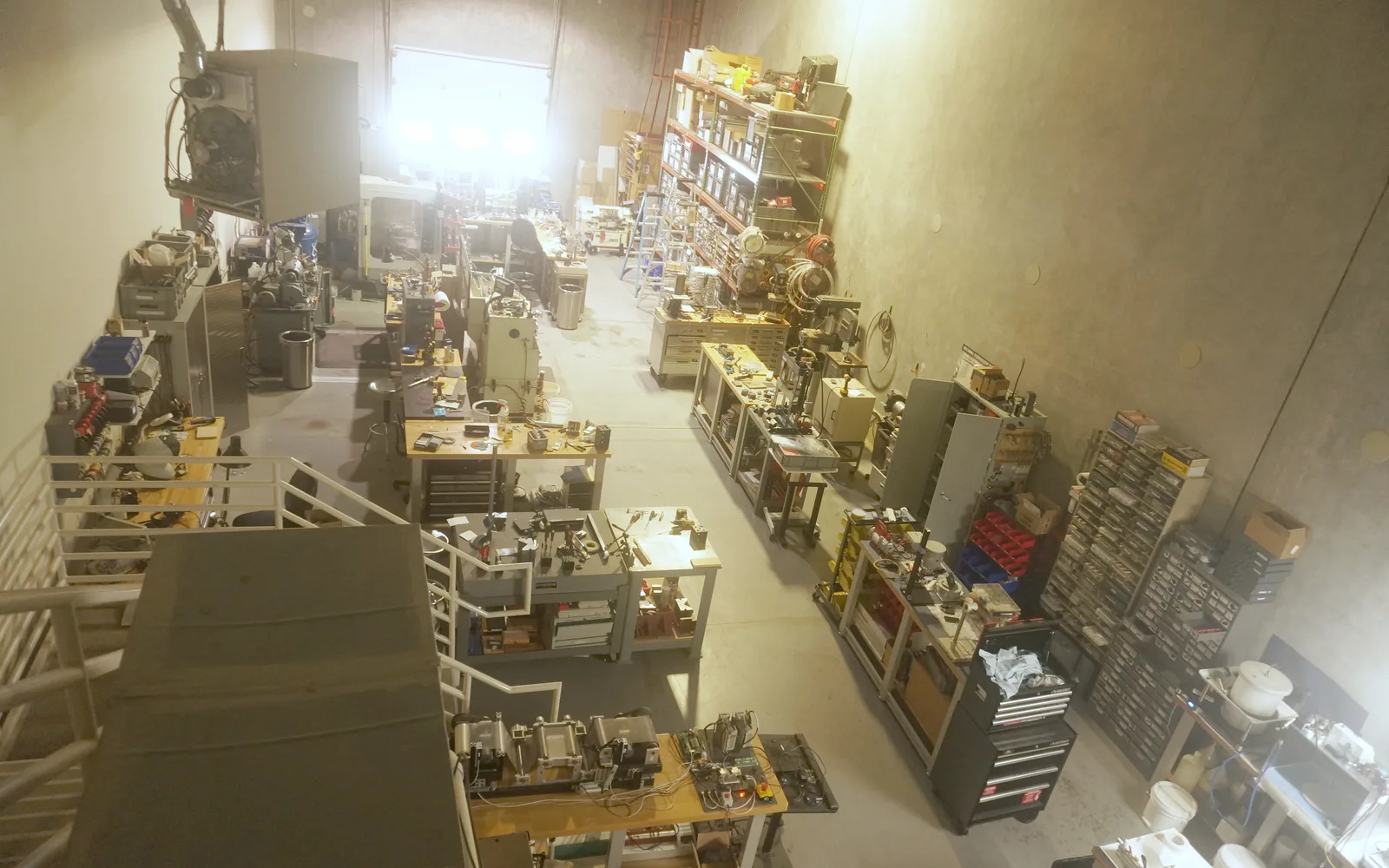 Workshop area with machining, electronics, storage, and prototype equipment